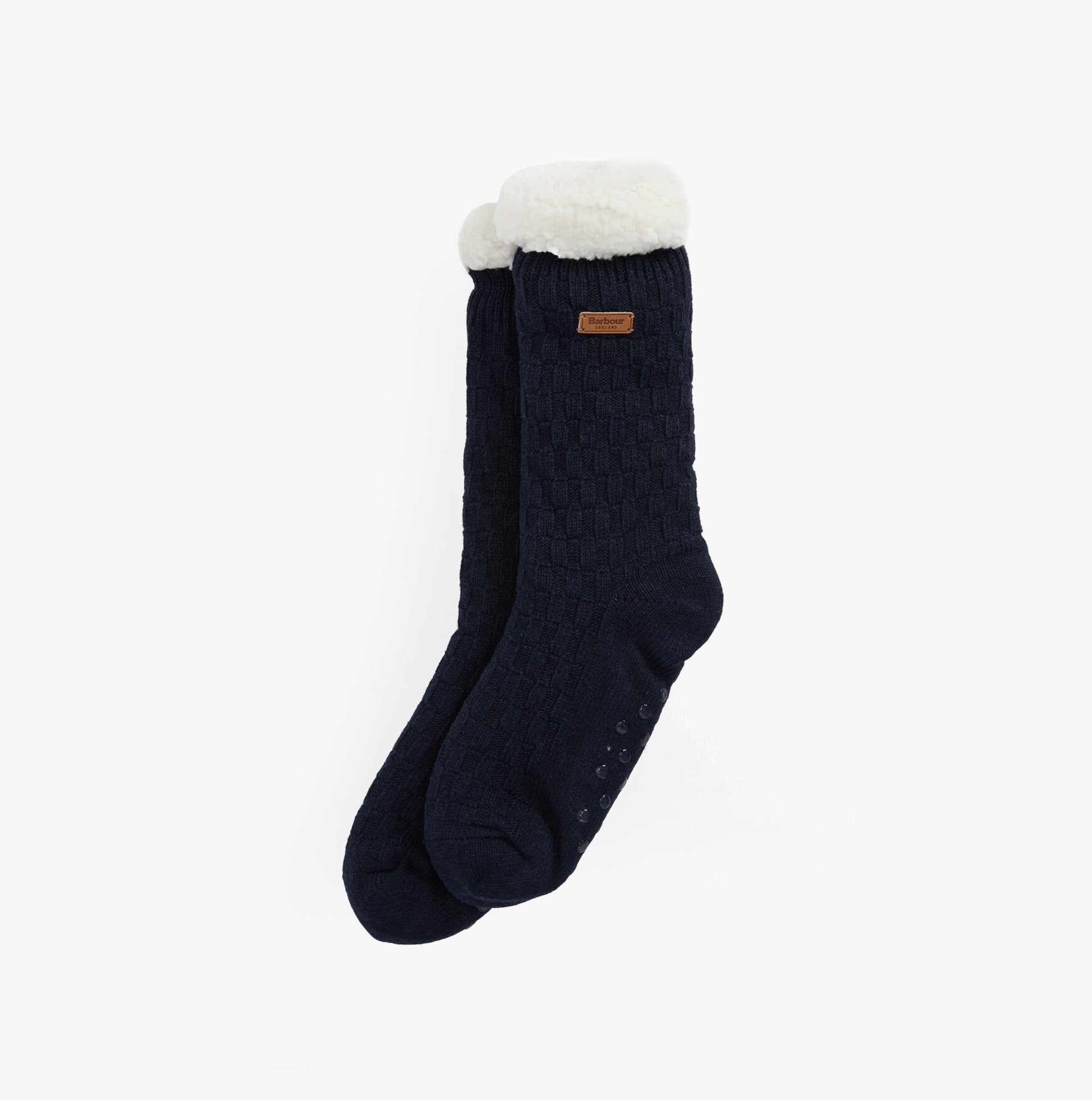 Barbour CABLE KNIT LOUNGE SOCKS Womens Socks Navy side view showing plush lining and cable knit texture.