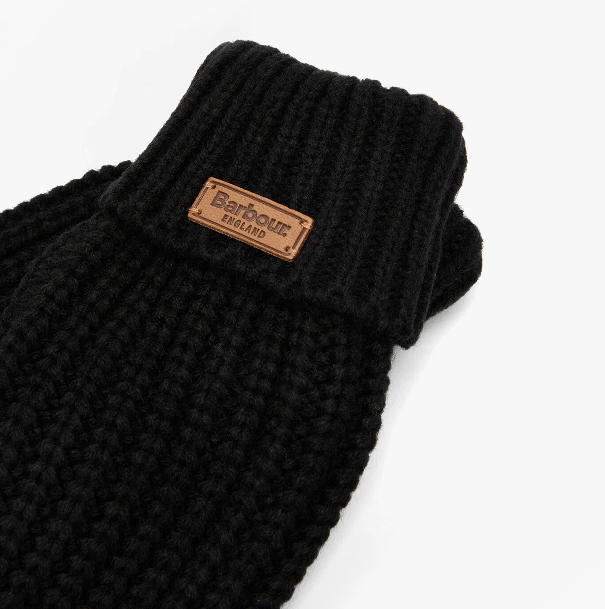 Barbour SALTBURN KNITTED Womens Gloves Black detail view with tag, showing textured acrylic knit and cozy design.