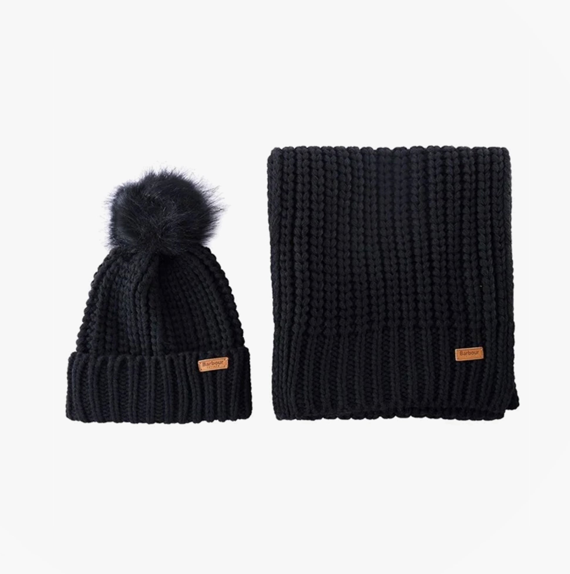 Barbour SALTBURN BEANIE & SCARF Womens Gift Set Black - Front view of knit beanie and scarf in black with fur pom and leather badge.