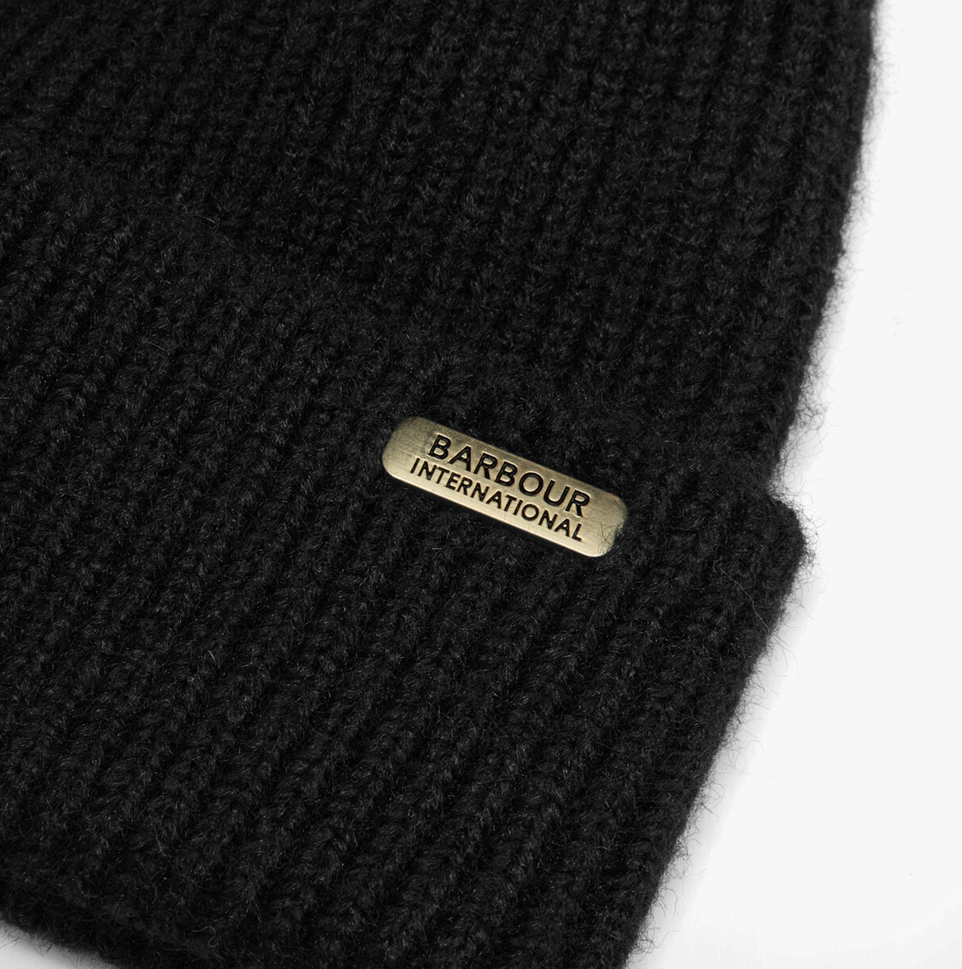 Barbour PENDLE BEANIE & MILLA SCARF Gift Set Womens Black/Jasmine detail view of black beanie with logo.