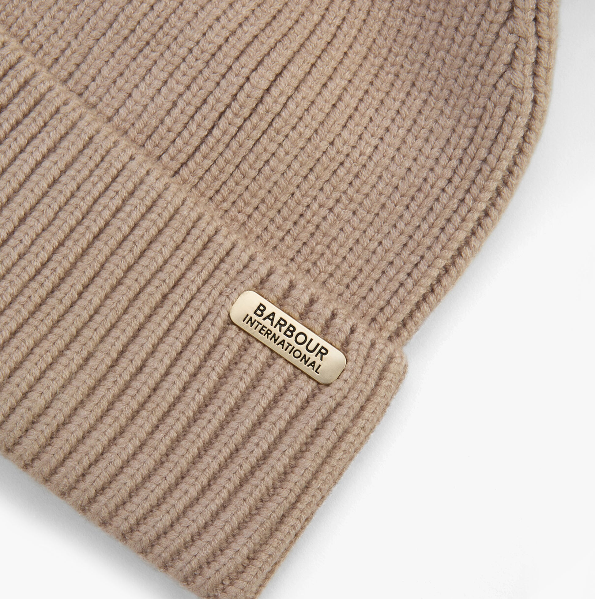 Barbour MALLORY POM Womens Beanie Oat detail view showing ribbed texture and logo badge