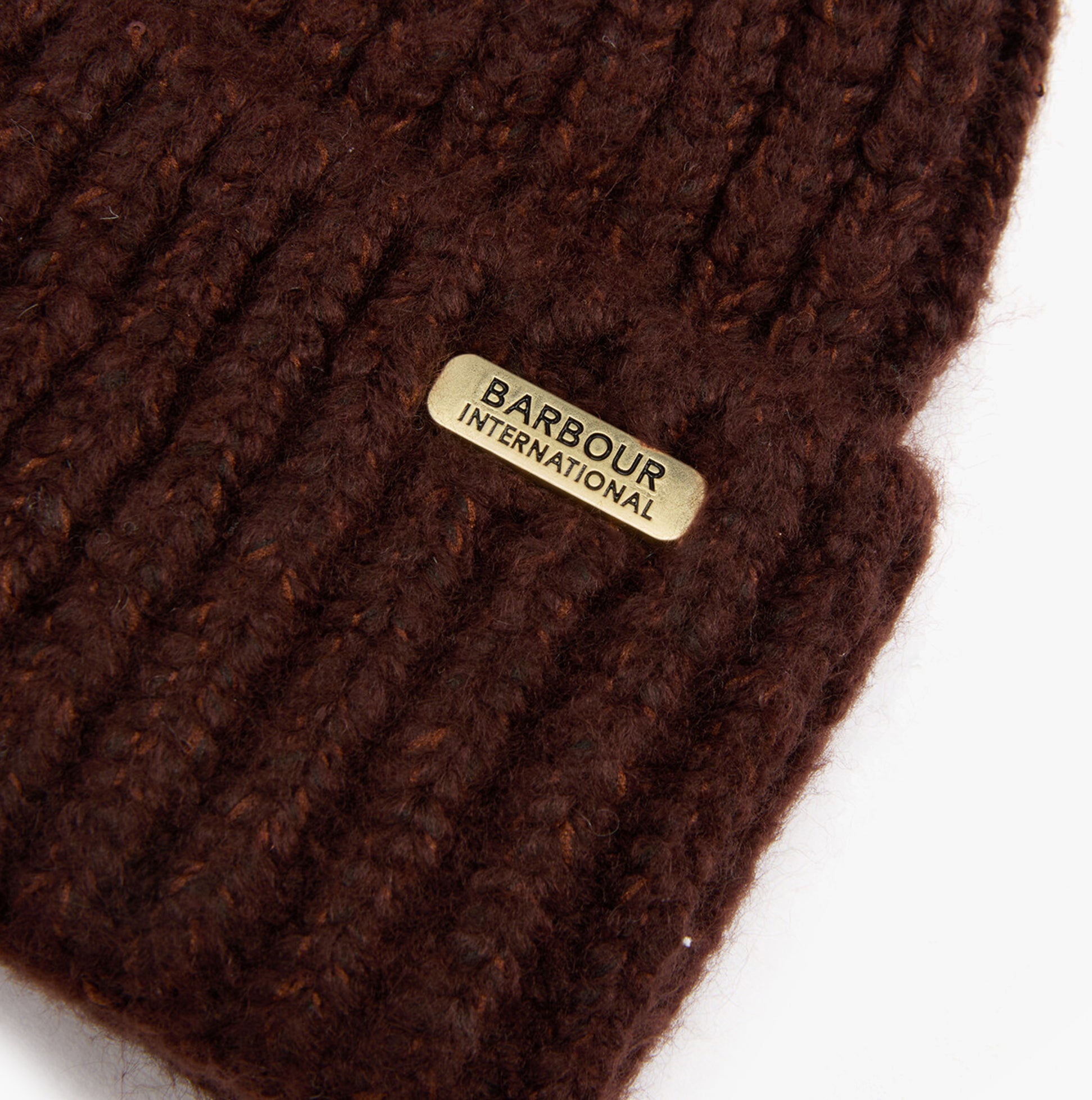 Barbour ARIA Womens Beanie Chocolate detail view showing textured knit and brand label.