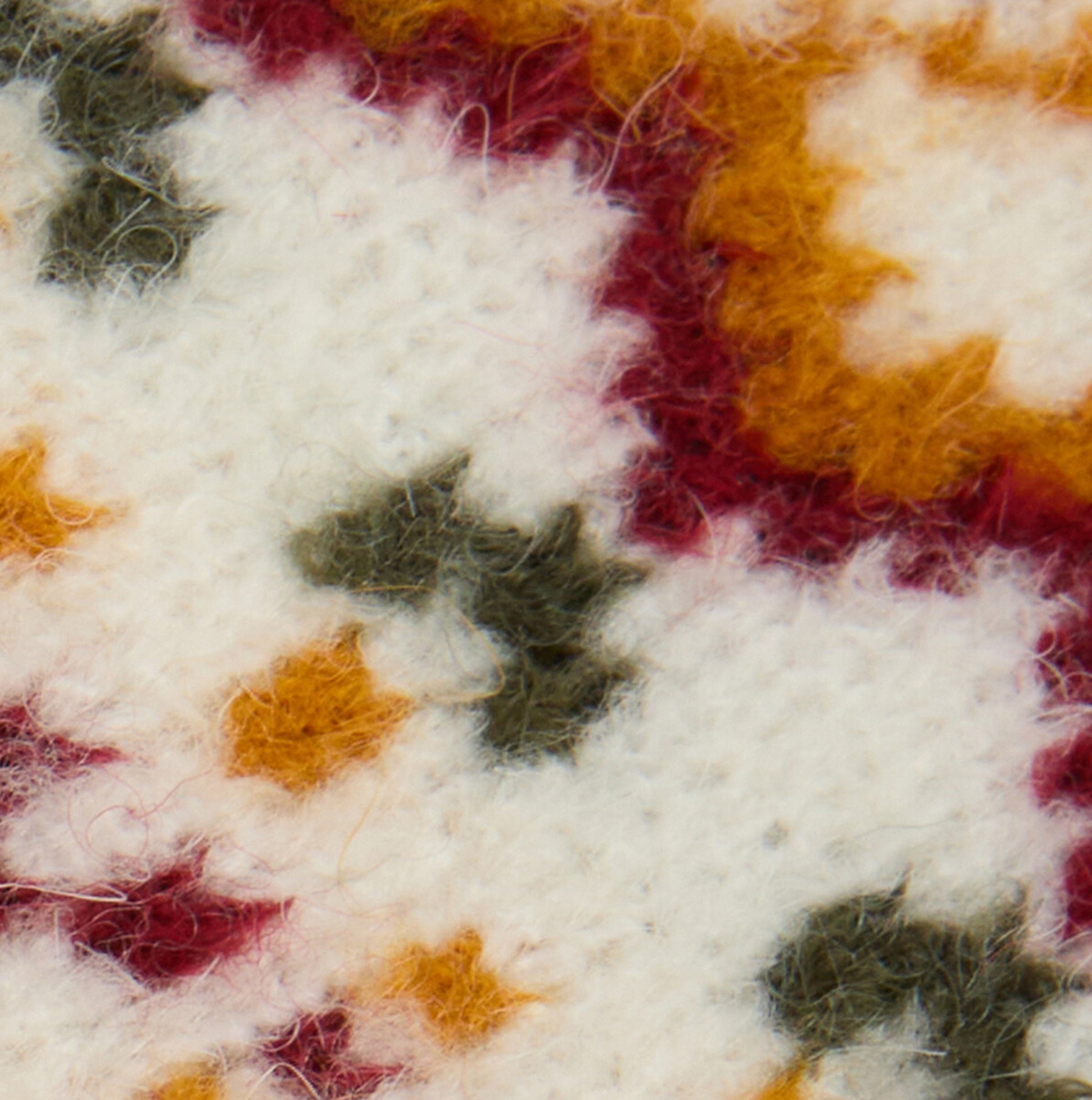 Barbour KINGSFORD FAIR ISLE Womens Beanie Cloud texture detail view featuring colorful floral pattern.