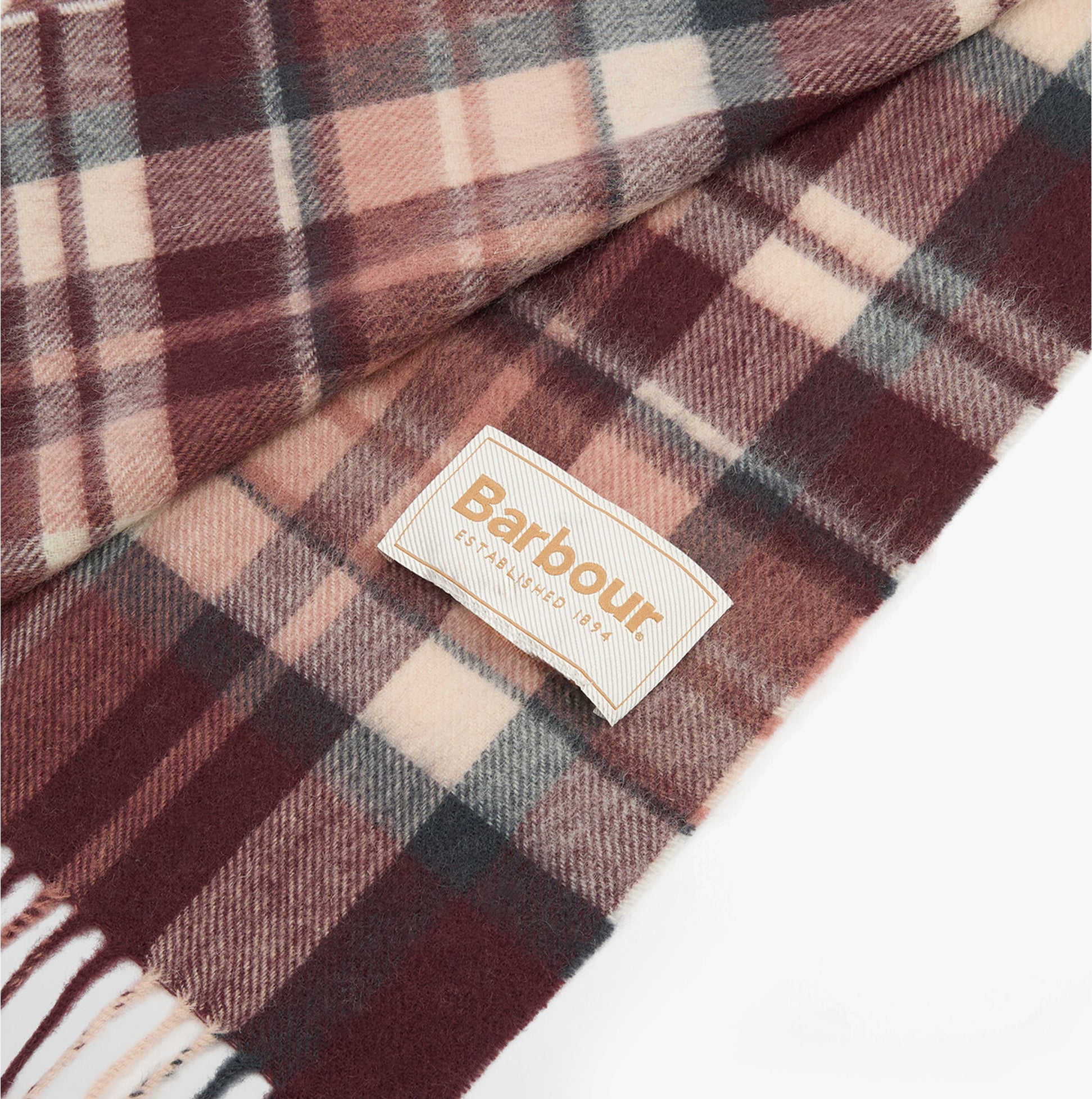 Barbour VINTAGE PLAID Womens Winter Fudge detail view of scarf with label and plaid pattern in warm tones.