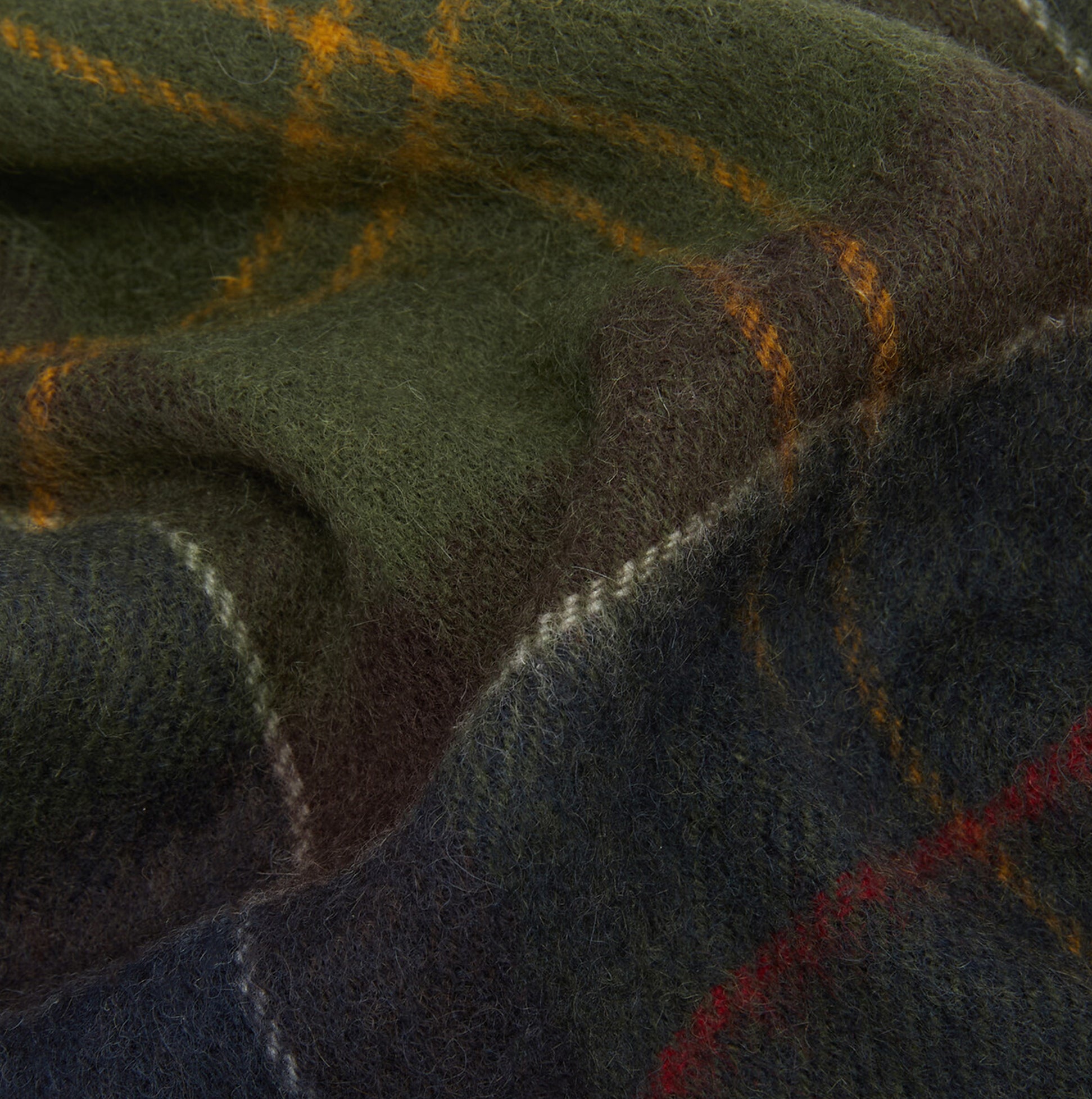 Barbour TARTAN Womens Winter Classic Tartan detail view of the soft lambswool and cashmere texture in green and navy.