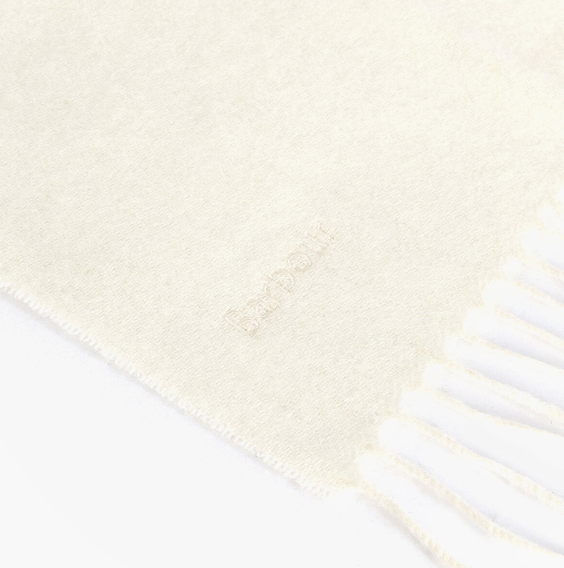 Barbour LAMBSWOOL WOVEN Womens Winter Cream detail view showing soft lambswool texture and brand logo.