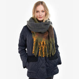 Barbour ISLA TARTAN BOUCLE Scarf Womens Classic styled on model in front view, showcasing all-over tartan pattern and tasselled trims.