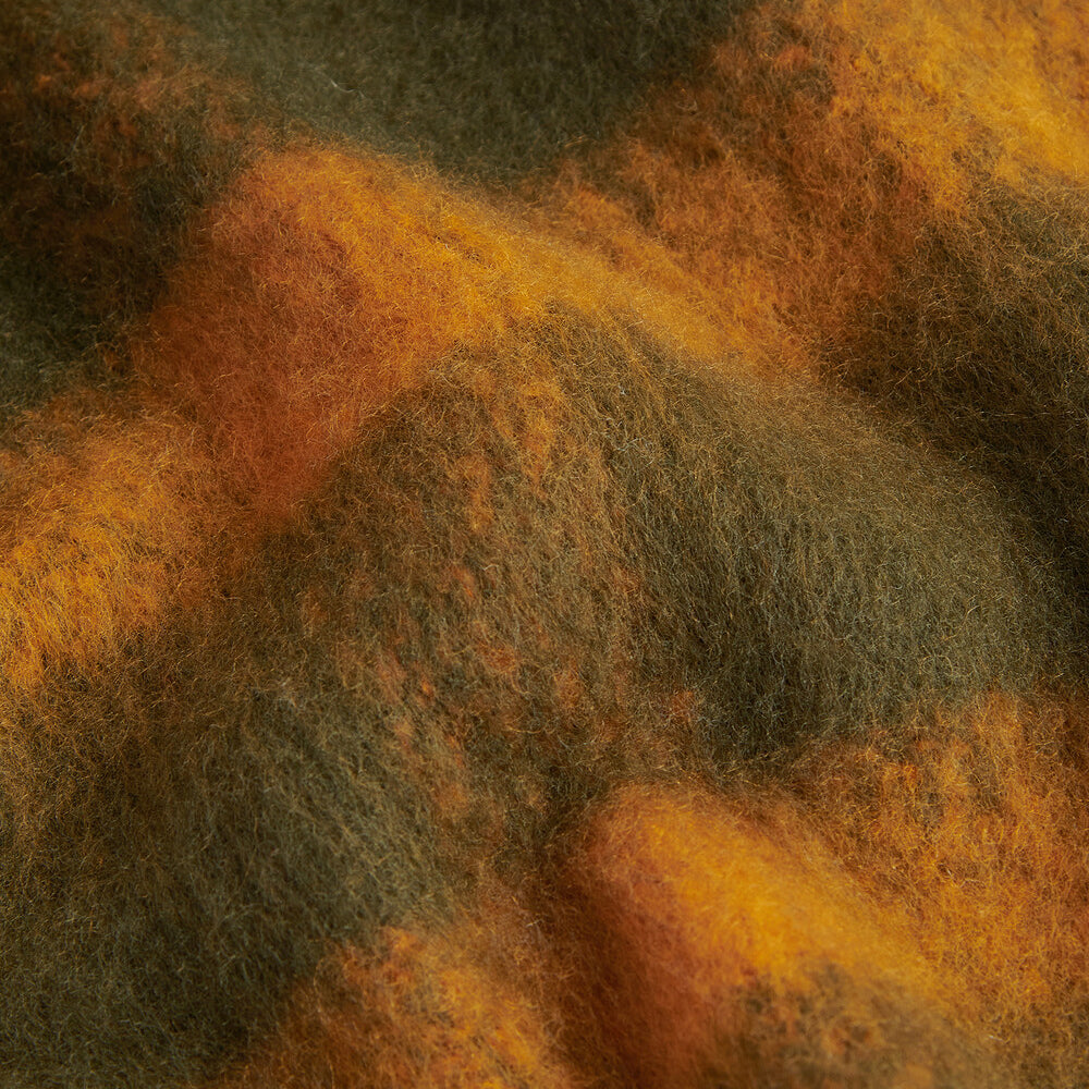 Barbour ISLA TARTAN BOUCLE Scarf Womens Classic detail view showcasing soft fabric in orange and green tartan pattern.