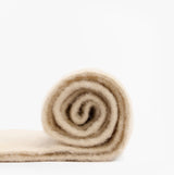 Barbour ELLISON Womens Winter Oatmeal rolled scarf side view, soft beige polyester material.