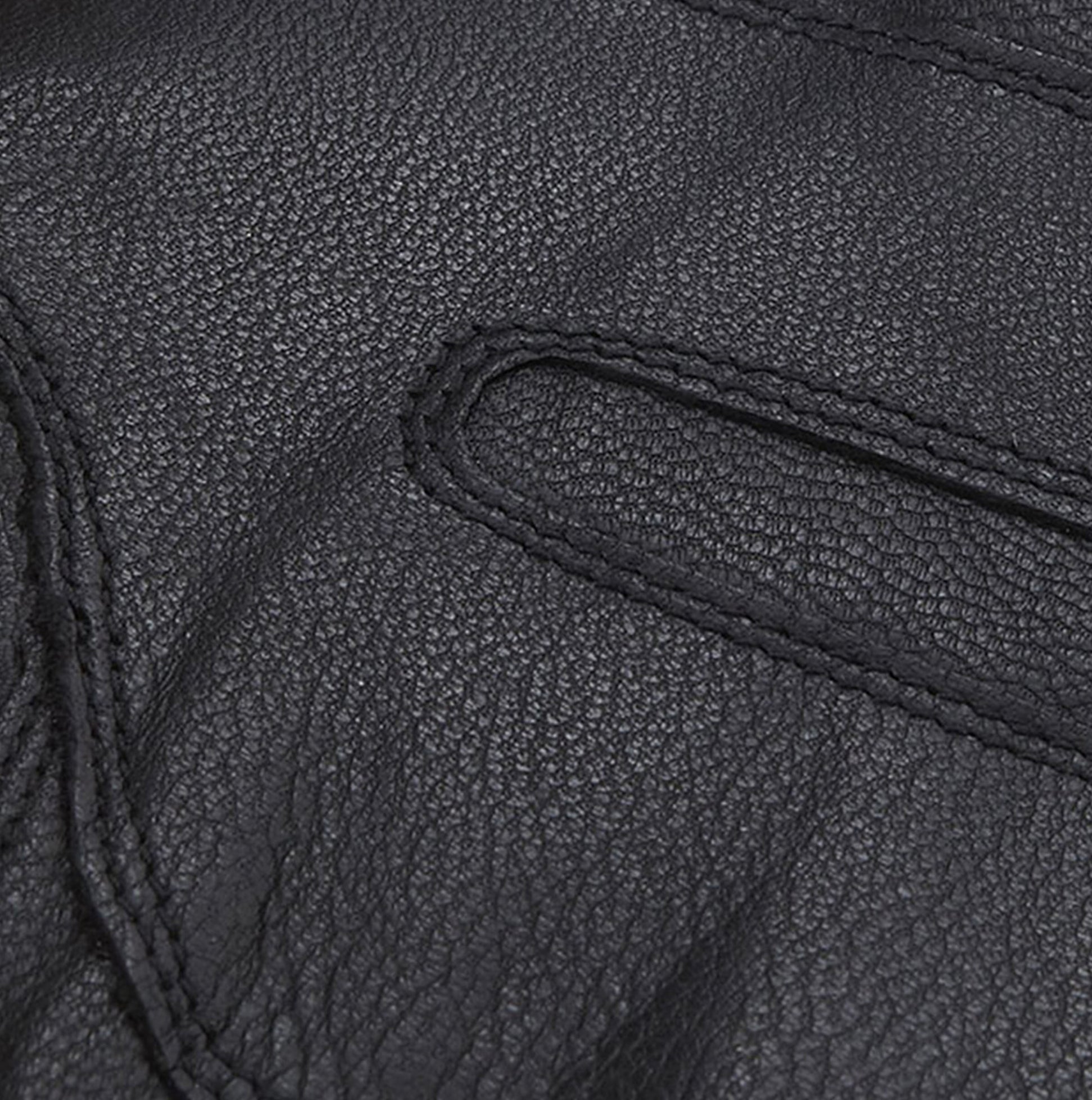 Barbour BURNISHED LEATHER THINSULATE Mens Gloves Black detail view showing texture and stitching of the leather.