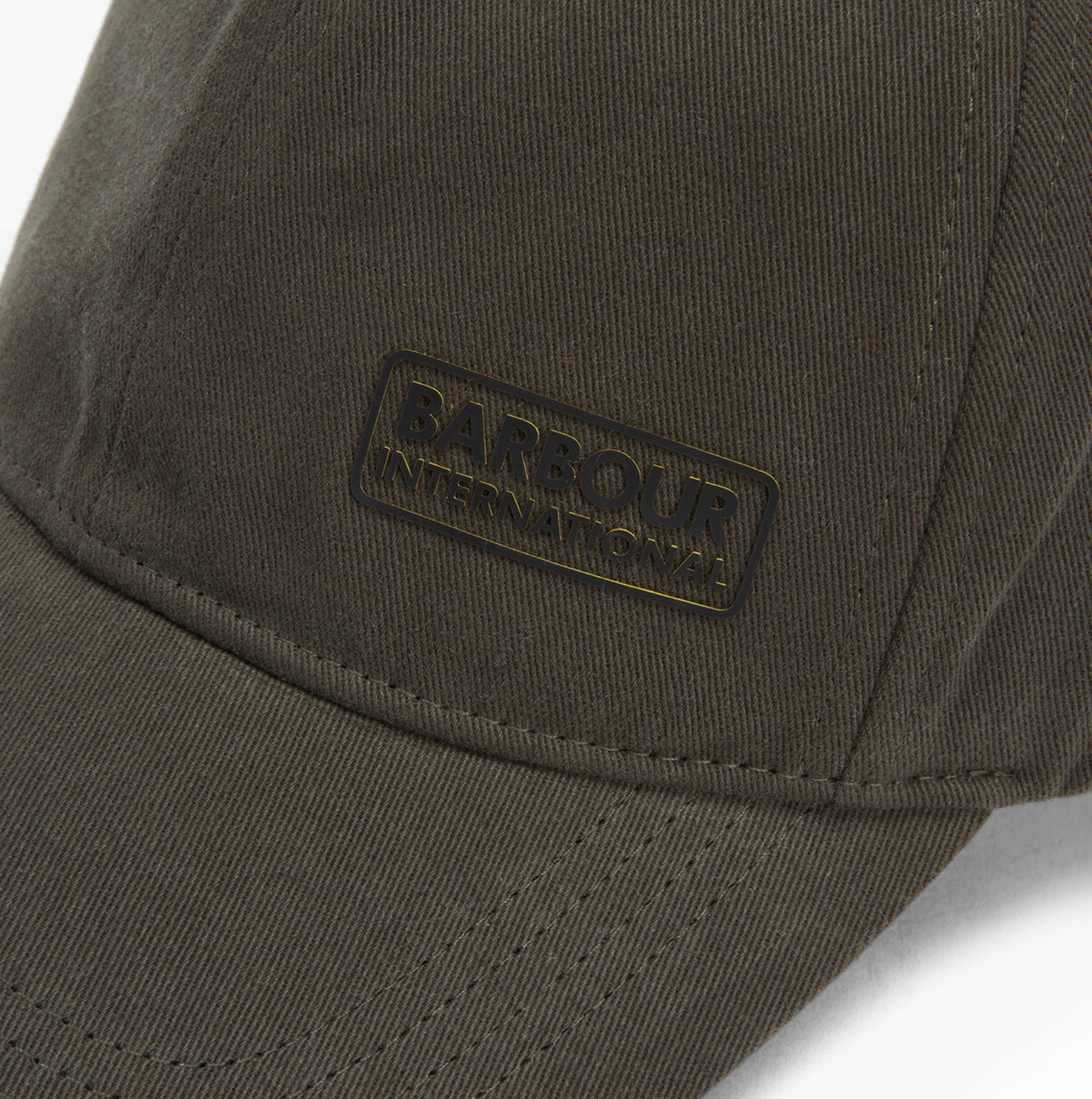 Barbour NORTON Drill Cap Mens Snapback Caps Sage/Shadow detail view showing cap logo and texture.