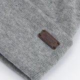 Barbour HEALEY Mens Beanie Light Grey Marl detail view showing the tag and texture.
