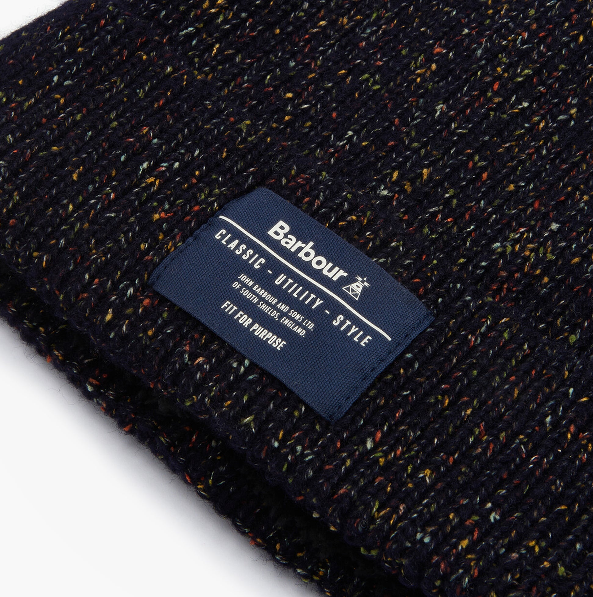 Barbour ESTON Mens Beanie Navy detail view showcasing fabric texture and brand label.