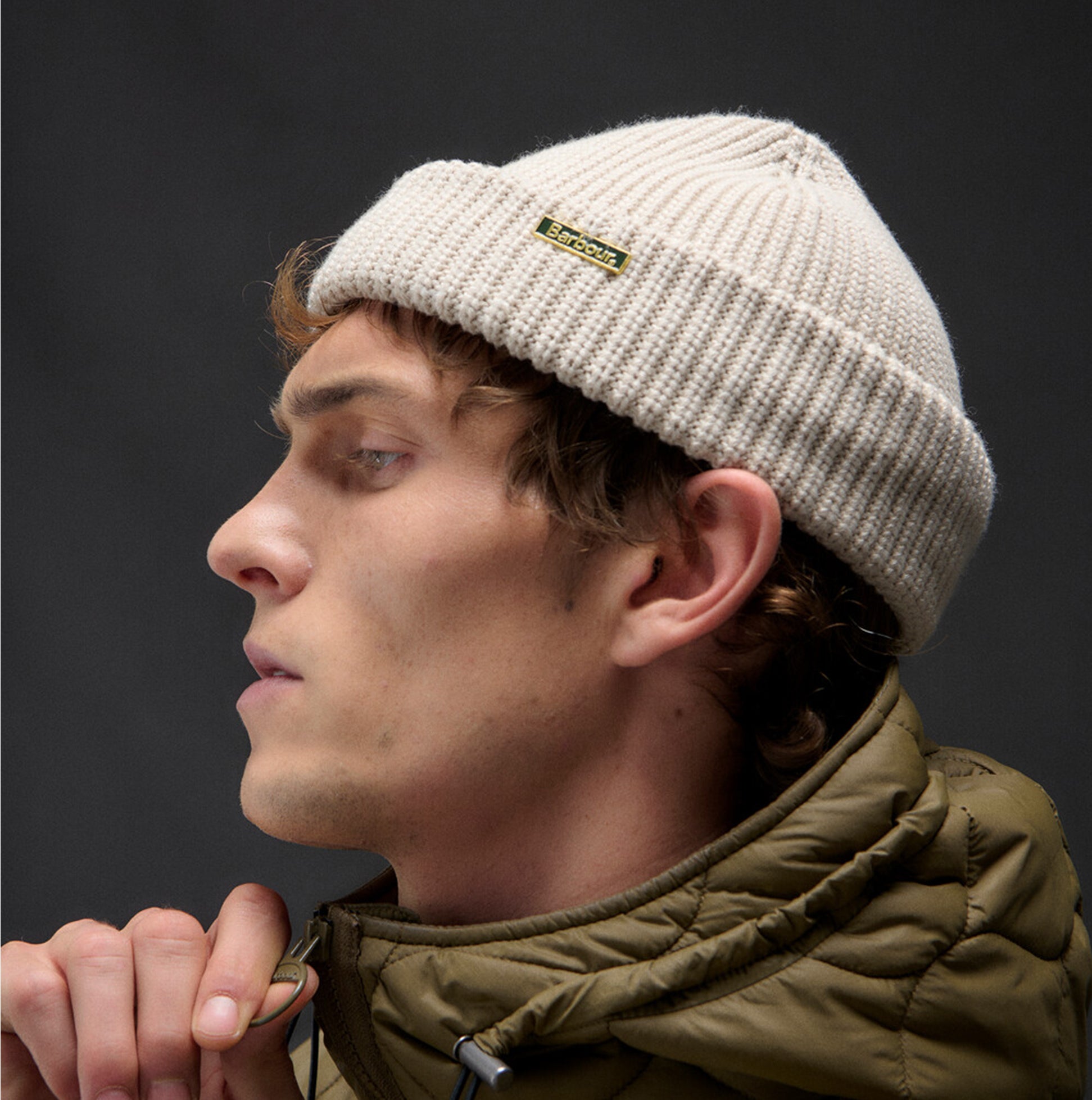 Barbour MOSELY Mens Beanie Mist side view on model, showcasing the textured knit and brand label.