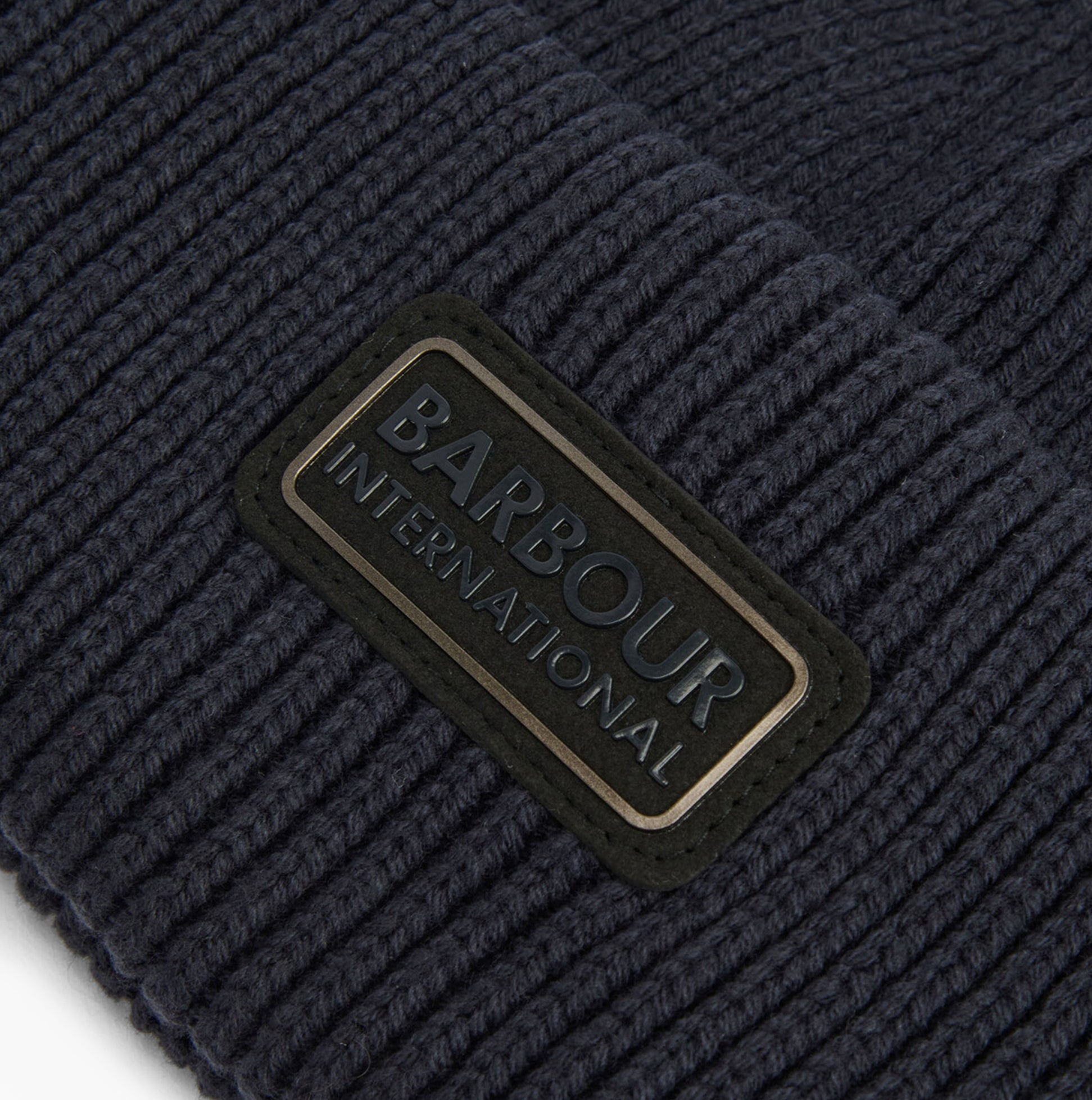 Barbour CRAYWELL Mens Beanie Navy detail view showing the label on the beanie's cuff.