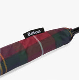 Barbour Tartan Walker Umbrella detail view with woven Barbour side flag label on the canopy sleeve.