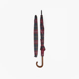 Barbour Tartan Walker Umbrella open view showcasing the tartan pattern and brown curved handle.