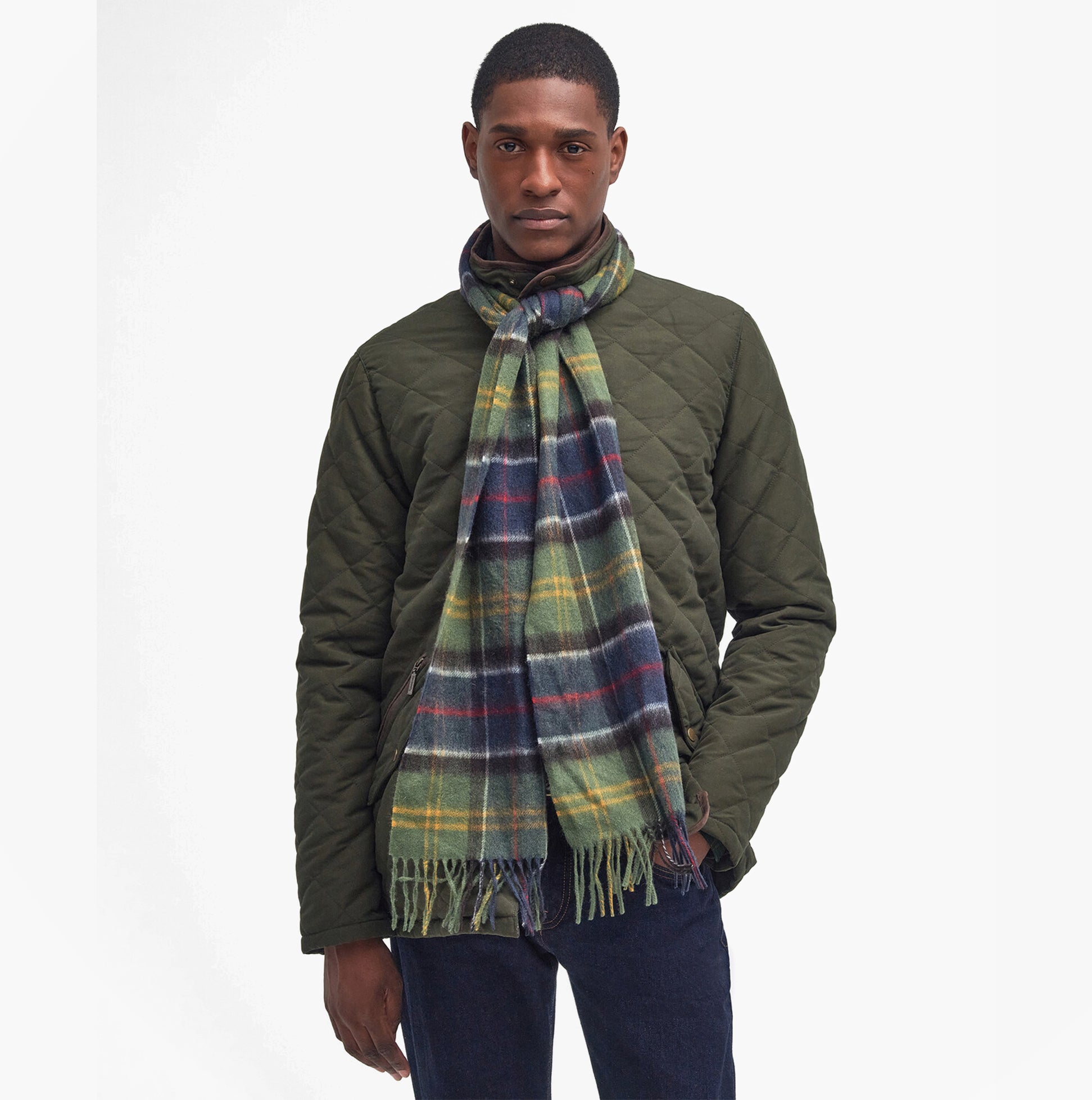 Barbour WOOL CASHMERE TARTAN Mens Winter Classic front view model wearing a plaid scarf with fringe, styled with a quilted jacket.