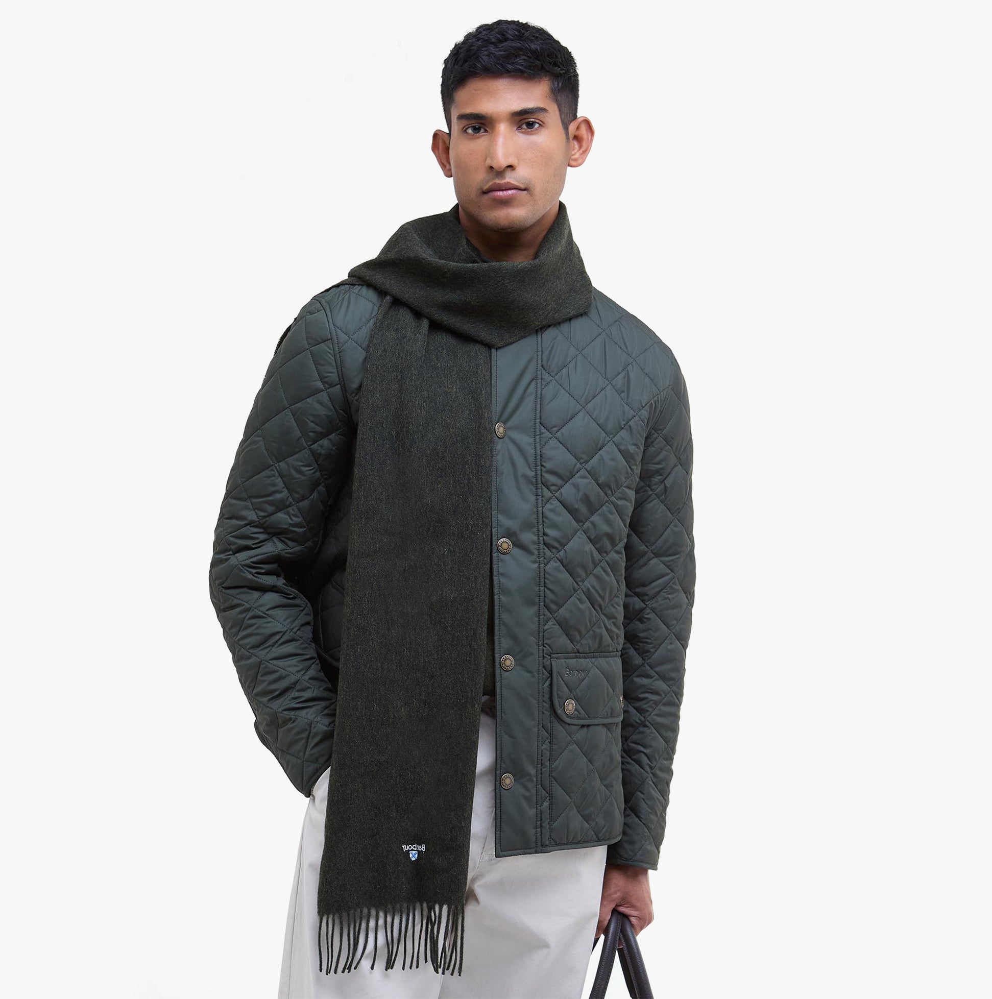 Barbour PLAIN LAMBSWOOL Mens Winter Seaweed scarf draped on model with quilted jacket, front view.