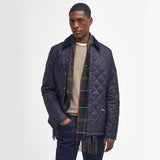Barbour GALINGALE Unisex Adults Tartan Scarf Classic worn with quilted jacket, front view showcasing scarf details.