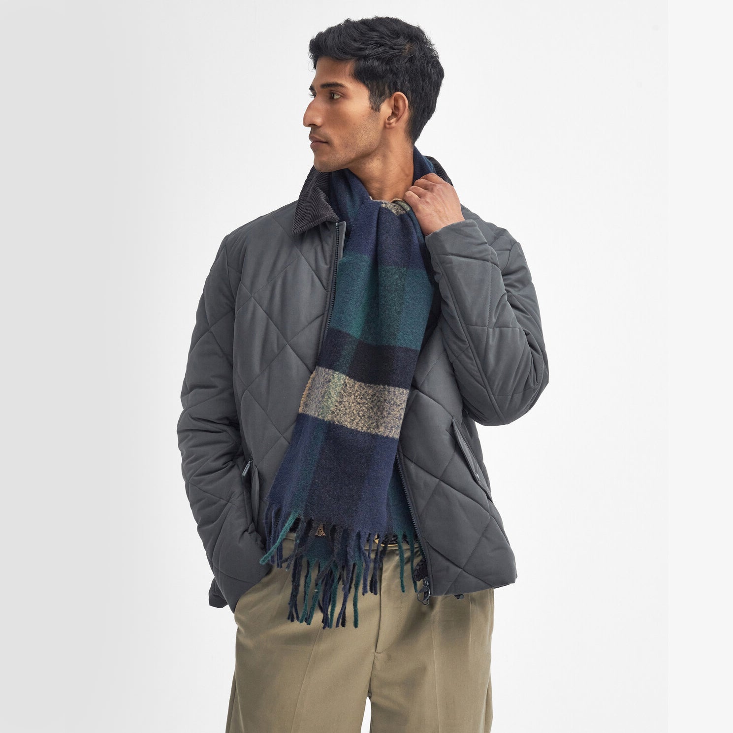 Barbour WESTERDALE Scarf Unisex Adults Green Loch front view worn by model with quilted jacket