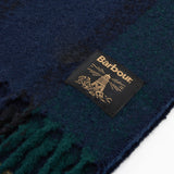 Detail view of Barbour WESTERDALE Scarf Unisex Adults Green Loch showcasing brand label on soft fabric.
