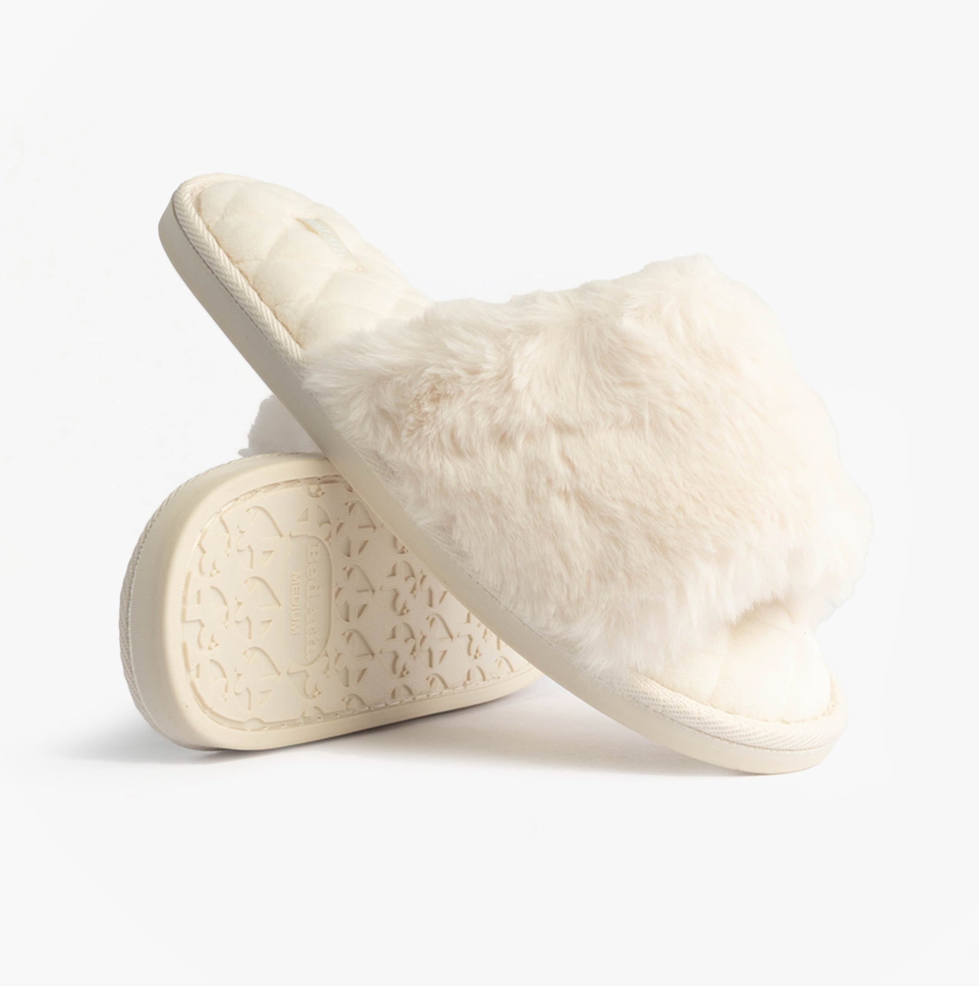 Bedroom Athletics ERIN Womens Slipper Sliders Cream, side view of cream faux fur slide slippers with rubber sole.