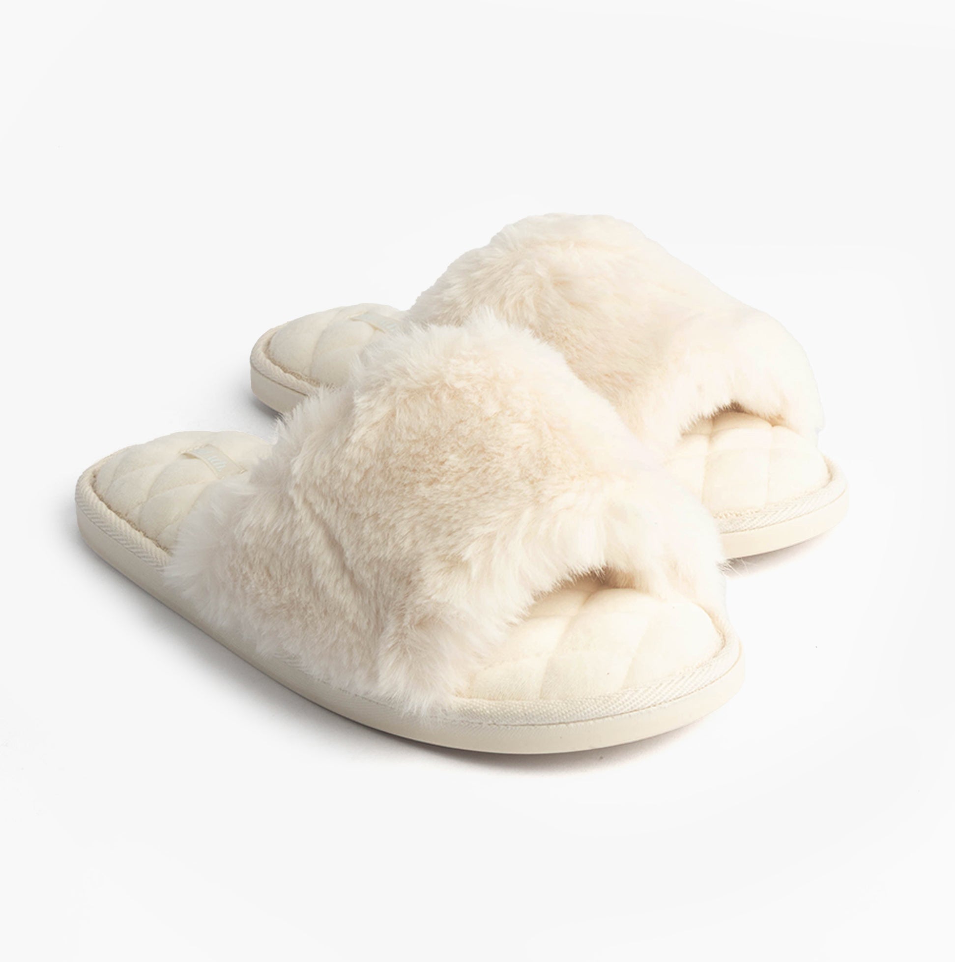 Bedroom Athletics ERIN Womens Slipper Sliders Cream side view showcasing faux fur upper and quilted sole.