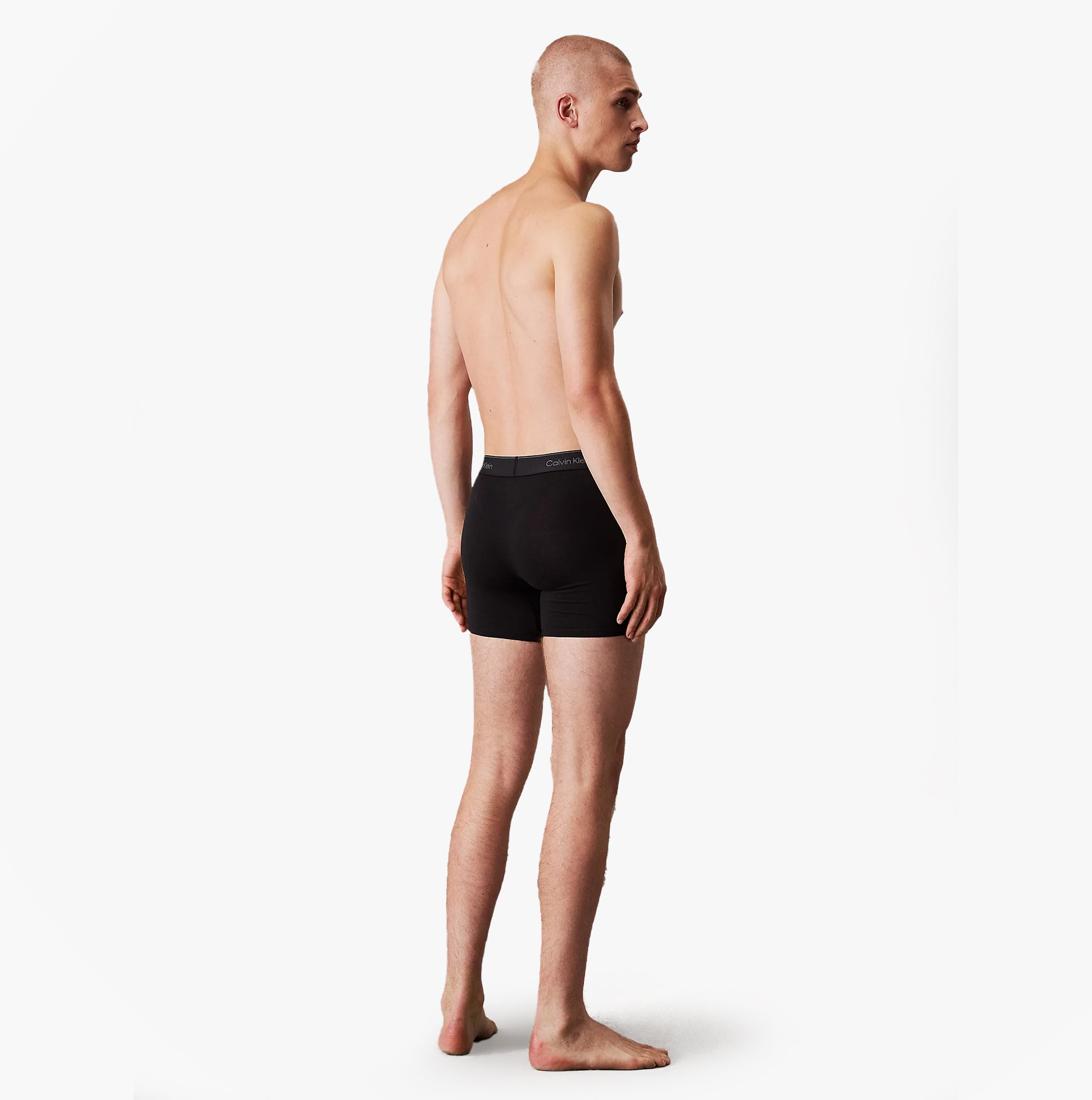 Calvin Klein ICON MODAL MESH 3 Pack Mens Boxer Briefs Multicoloured, black boxer briefs in side view on model.