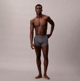 Calvin Klein TRUNK 3 Pack Mens Cotton Classics Multicoloured front view of model wearing grey trunk underwear.