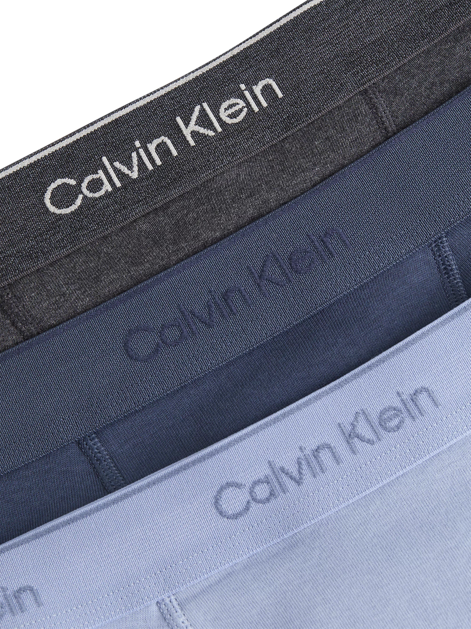 Calvin Klein COTTON CLASSICS Mens 3 Pack Trunks Multicoloured detail view showing three trunks in navy, light blue, and dark grey.