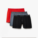 Calvin Klein 3 Pack Mens Knit Boxers Multicoloured, featuring red, grey, and black boxers in a front view.