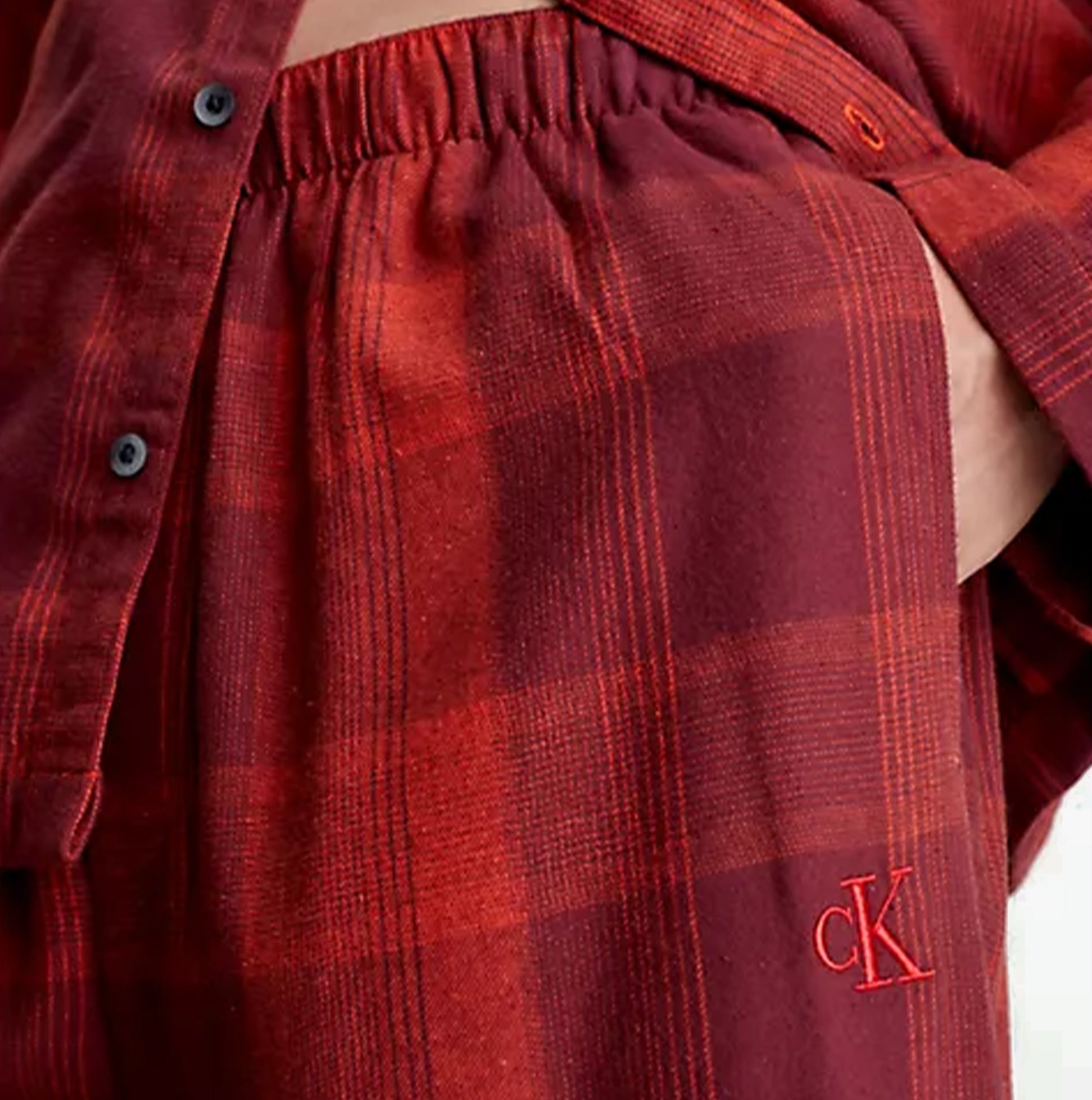 Calvin Klein FLANNEL Mens Pyjama Set Red detail view of waistband and CK logo embroidery.
