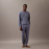 Calvin Klein ICON COTTON TERRY Mens Lounge Joggers Grisaille front view on model, showcasing comfort and breathable material.