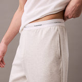 Calvin Klein ICON COTTON TERRY Mens Lounge Joggers Grey Heather side view showing CK signature elastic waistband and side seam pockets.
