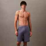 Calvin Klein SLEEP SHORT Mens Grisaille front view on model showcasing comfort and breathable material with side seam pockets.