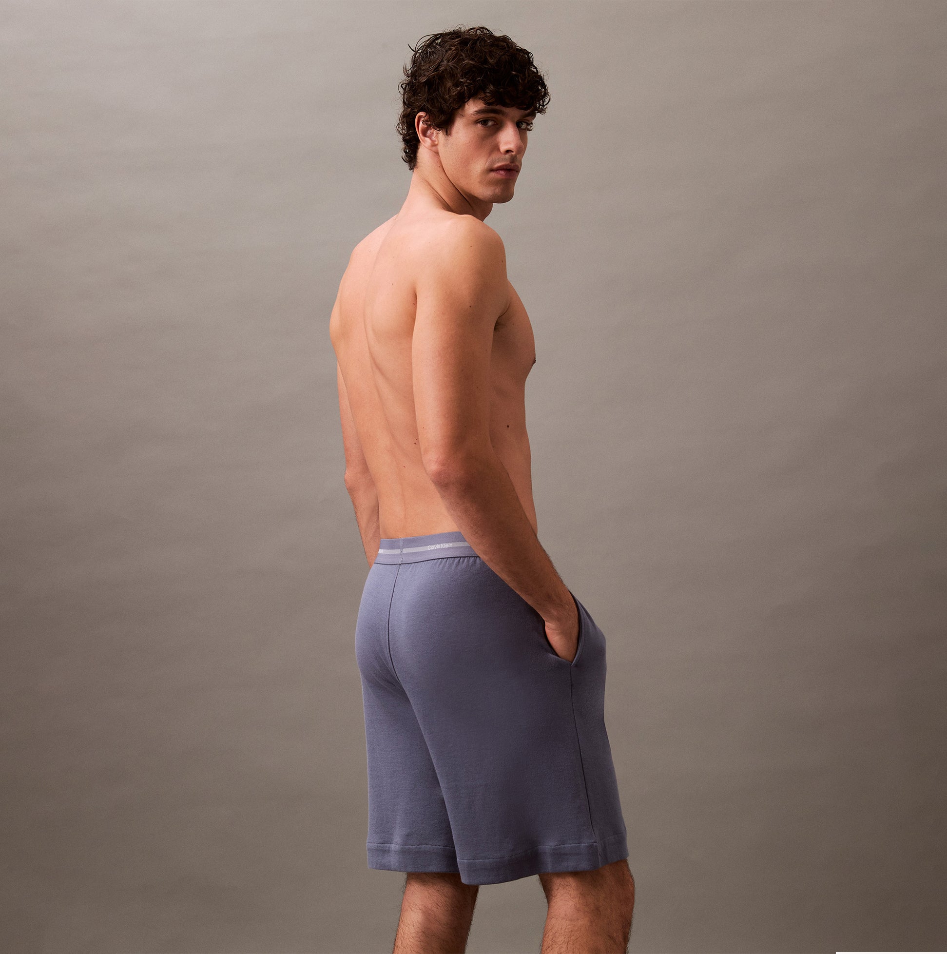 Calvin Klein SLEEP SHORT Mens Grisaille back view showing comfort shorts with side seam pockets and CK signature elastic waistband.