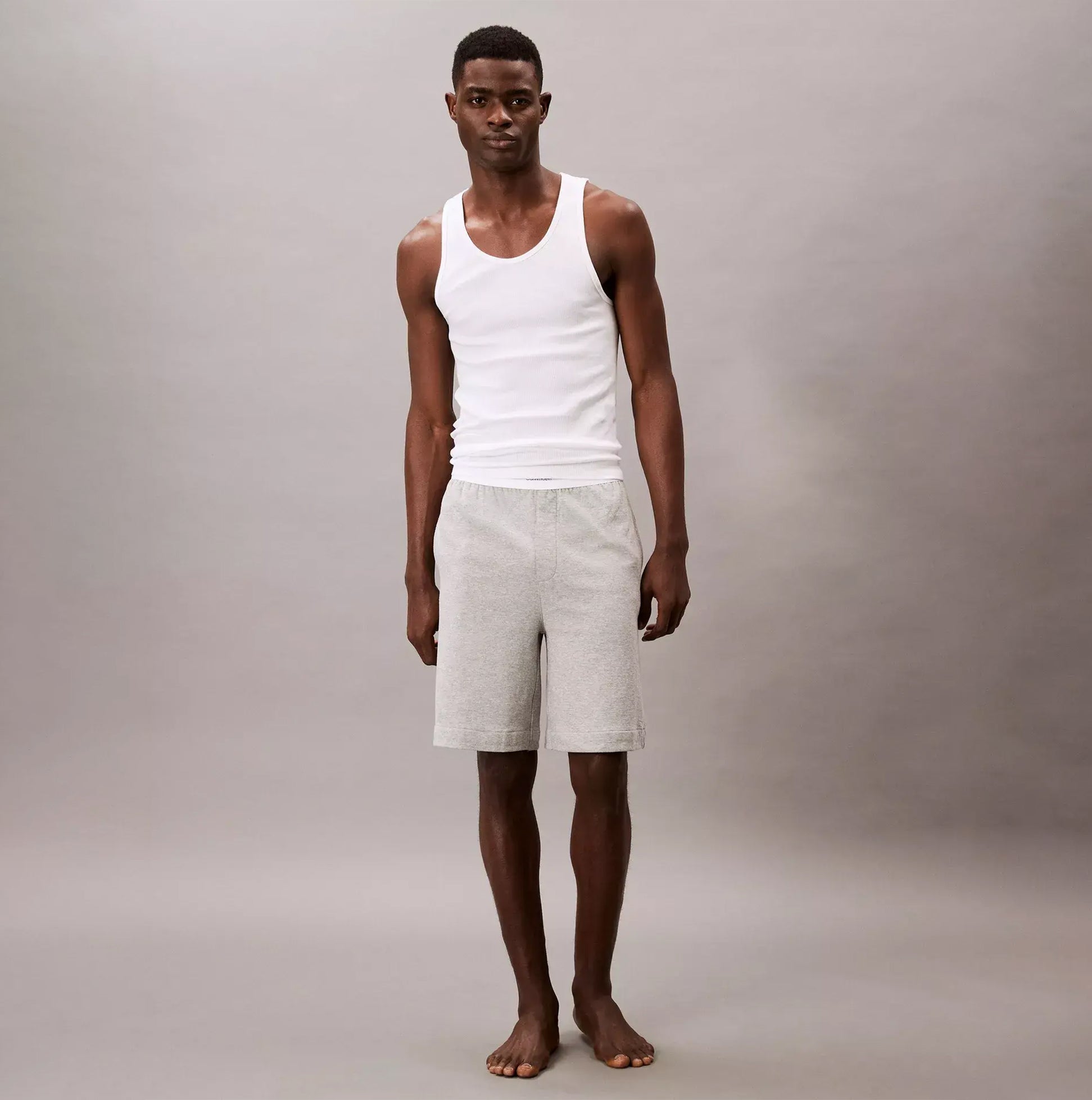 Calvin Klein SLEEP SHORT Mens Medium Grey Heather front view on model in tank top.