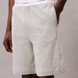 Calvin Klein SLEEP SHORT Mens Medium Grey Heather side view showcasing breathable material and CK signature elastic waistband.