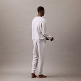 Calvin Klein ICON COTTON TERRY Mens Sweatshirt Medium Grey Heather back view model wearing sweatshirt and pants
