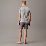 Calvin Klein ICON COTTON STRETCH Mens Lounge Shorts Diamond Logo/Smoked Pearl back view with grey t-shirt.