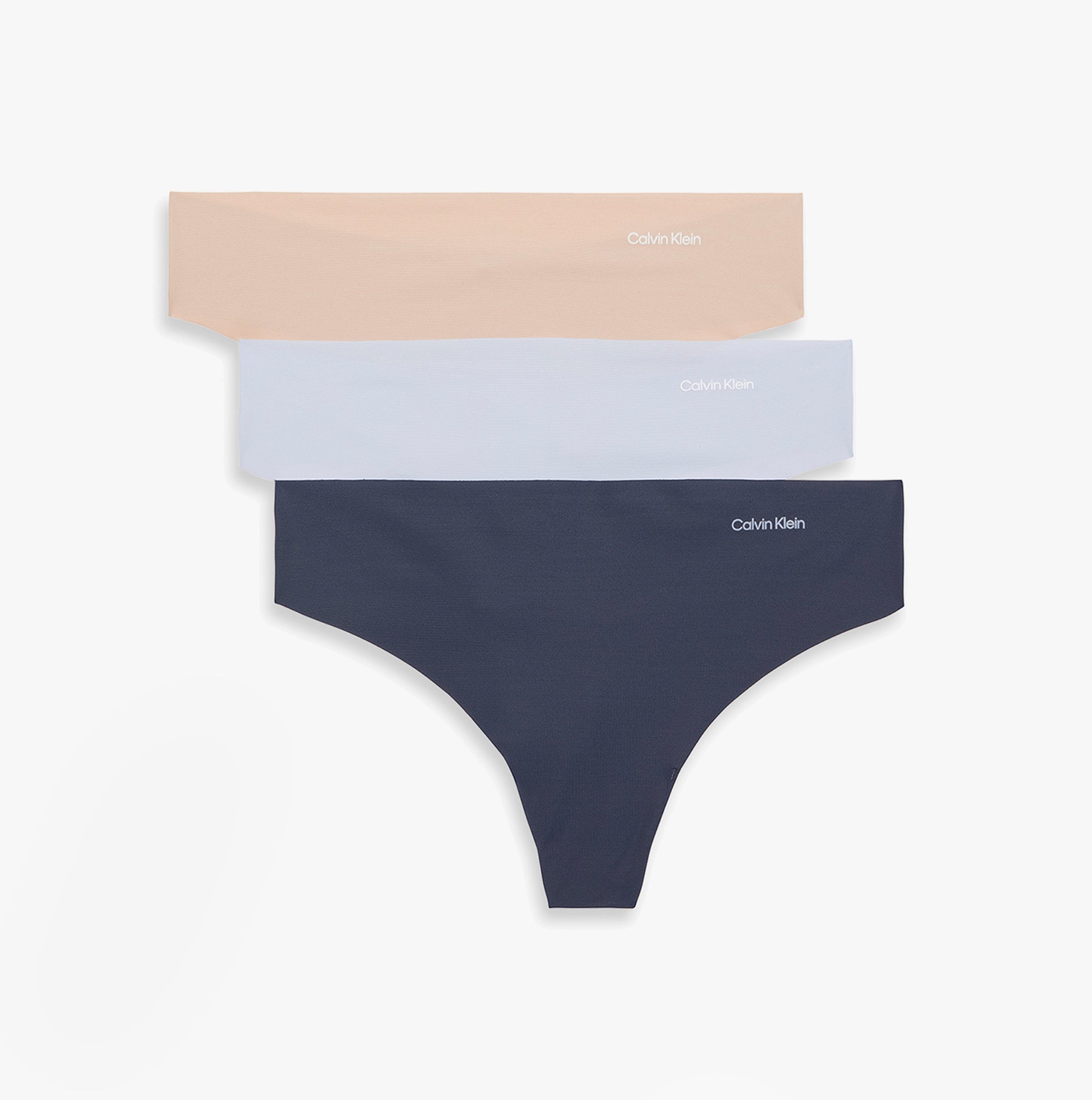 Calvin Klein Womens Invisible 3 Pack Thong Multi in front view, featuring nude, light blue, and navy colors with brand logo.