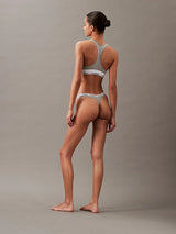 Calvin Klein MODERN LOGO Womens Thong Grey Heather back view showing medium-rise waist and CK signature elastic waistband.