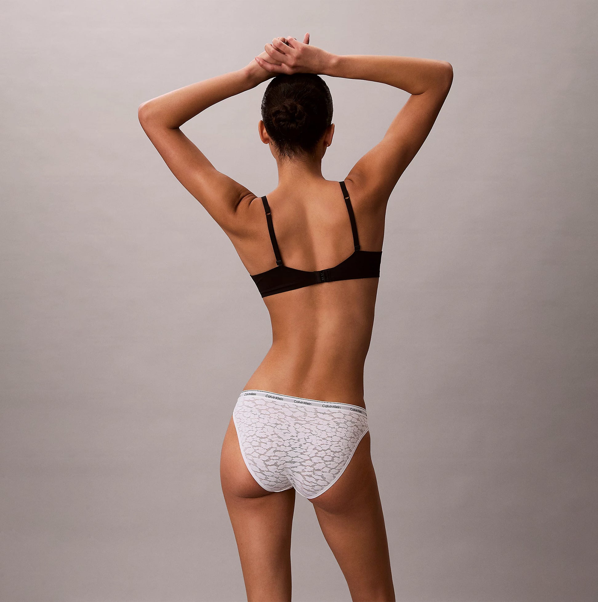 Calvin Klein BIKINI 3 PACK Womens Bikini Multicoloured, back view of model wearing white bikini with patterns.