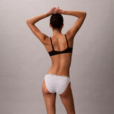 Calvin Klein BIKINI 3 PACK Womens Bikini Multicoloured, back view of model wearing white bikini with patterns.