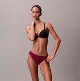 Calvin Klein BIKINI 3 PACK Womens Bikini Multicoloured side view model wearing bikini and bra in black and maroon.