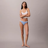 Calvin Klein BIKINI 3 PACK Womens Bikini Multicoloured front view model wearing light blue bikini and white tank top