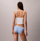 Calvin Klein BIKINI 3 PACK Womens Bikini Multicoloured back view with model wearing light blue bikini and white top.