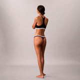 Calvin Klein THONG 5 PACK Womens Thong Multicoloured, back view of model wearing thong and matching bra.