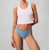 Calvin Klein BRAZILIAN 3 PACK Womens Multicoloured front view model wearing blue underwear and white crop top